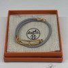 C202506154-Hermes-Mini-Clic-Chaine-D-Bracelet Pre-Owned/ Pre-Loved/ Second-Hand Hermes Mini Clic Chaine D Bracelet, Bracelet in Gris Meyer, Gold Hardware Color, T1 Size, Front View