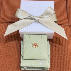 B202502454-Van-Cleef-Arpels-VCA-Ruby-Mini-Frivole-Bracelet Pre-Owned/ Pre-Loved/ Second-Hand Van Cleef & Arpels (VCA) Ruby Mini Frivole Bracelet, Bracelet in Rose Gold, Red Ruby Color, Mini Size, Front View