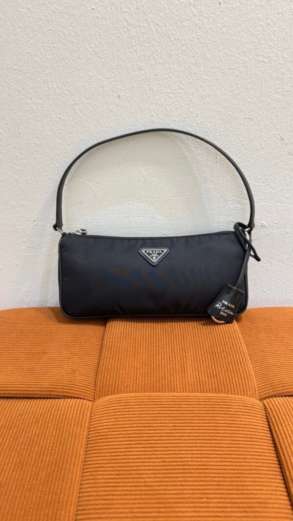 Pre-Owned/ Pre-Loved/ Second-Hand Prada 2005 Re-Edition Top Handle Shoulder Bag Nylon, Bag in Black, Silver Hardware Color, 24 x 11 x 6 CM Size, Front View