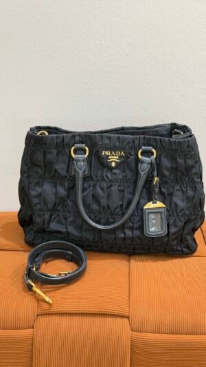 Pre-Owned/ Pre-Loved/ Second-Hand Prada Prada Nylon Tote, Bag in Black, Gold Hardware Color, 35 x 25 x 14 cm Size, Front View