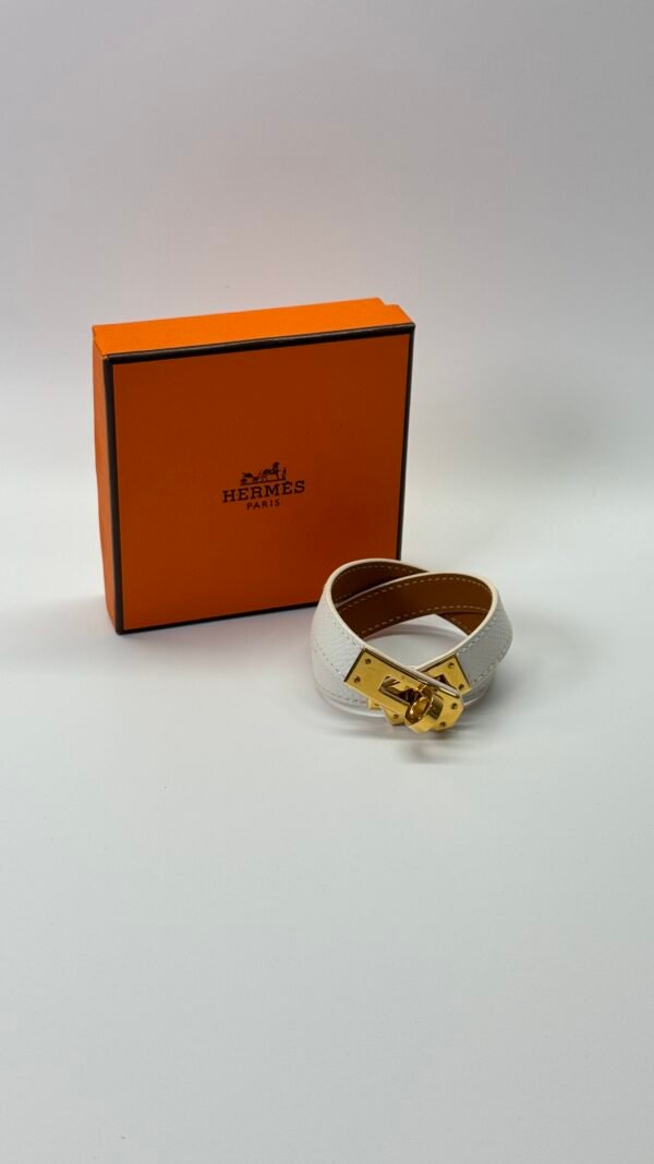 b202506471-hermes-double-kelly-bracelet Pre-Owned/ Pre-Loved/ Second-Hand Hermes Double Kelly Bracelet, Bracelet in White, Gold Plated Color, Small Size, Front View