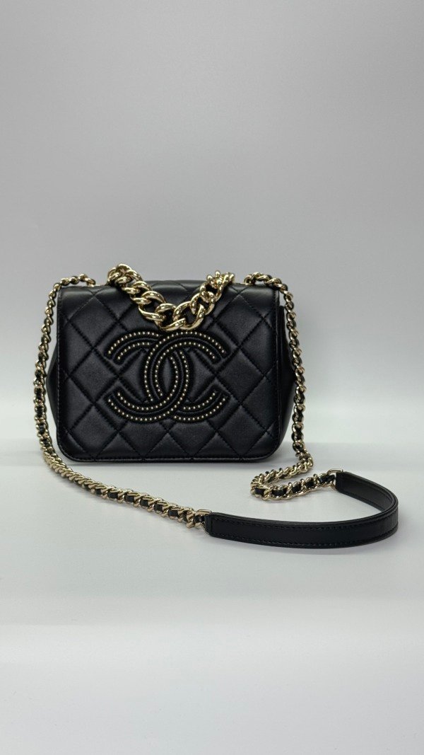 b202501562-chanel-seasonal-flap-1 Chanel | Studded Logo Mini Flap