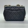 b202501562-chanel-seasonal-flap-3 Chanel | Studded Logo Mini Flap