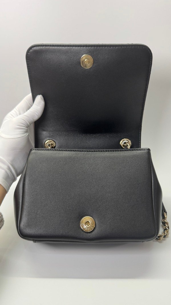 b202501562-chanel-seasonal-flap-7 Chanel | Studded Logo Mini Flap