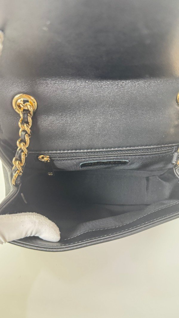 b202501562-chanel-seasonal-flap-8 Chanel | Studded Logo Mini Flap