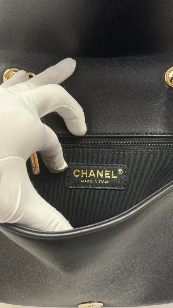 b202501562-chanel-seasonal-flap-9 Chanel | Studded Logo Mini Flap