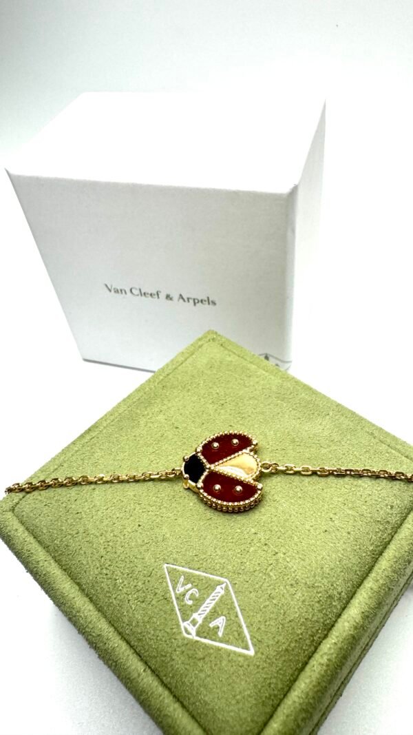 c202502568-van-cleef-arpels-vca-lucky-spring-lady-buy-open-wing-1 Pre-Owned/ Pre-Loved/ Second-Hand Van Cleef & Arpels (VCA) Lucky Spring Lady Buy (Open Wing), Bracelet in Carnelian, Onyx, Rose Gold Color, 17.5cm Size, Front View