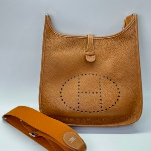Pre-Owned/ Pre-Loved/ Second-Hand Hermes Evelyne 29 PM Clemence, Bag in Gold, Palladium Hardware Color, 29 x 30 x 8 cm Size, Front View