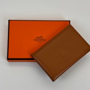 c202606771-hermes-calvi-card-holder Pre-Owned/ Pre-Loved/ Second-Hand Hermes Calvi Card Holder, Wallet in Gold Color, Size, Front View