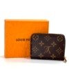 c202605802-louis-vuitton-lv-key-coin-zippy-purse-vivienne-holiday-collection Pre-Owned/ Pre-Loved/ Second-Hand Louis Vuitton (LV) Key & Coin Zippy Purse, Vivienne Holiday Collection, Wallet in Monogram Color, Size, Front View