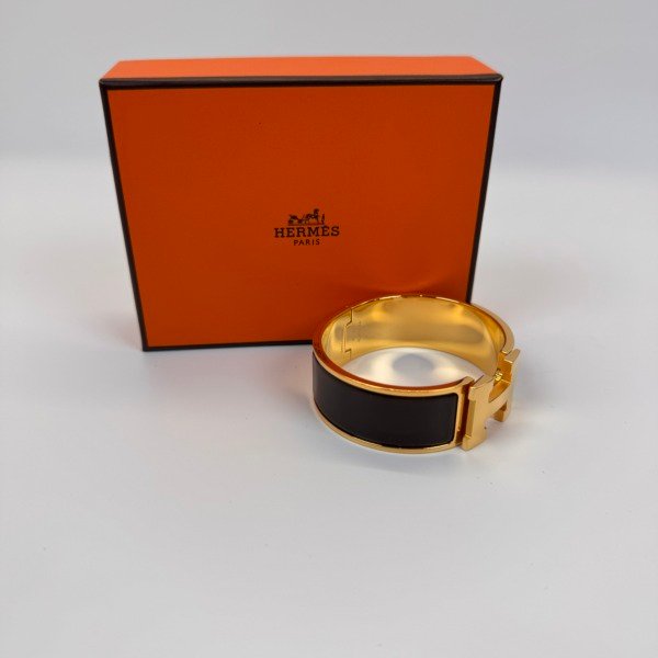 Pre-Owned/ Pre-Loved/ Second-Hand Hermes Clic Clac H  Bracelet , Bracelet in Ebene, Gold Hardware Color, PM (16cm) Size, Front View