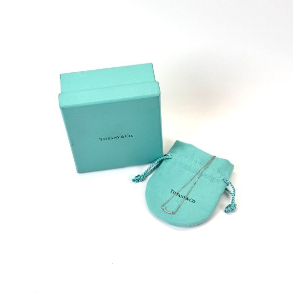 Pre-Owned/ Pre-Loved/ Second-Hand Tiffany & Co. Diamond Mini T Smile Pendant (box and pouch is for illustration only), Necklace in White Gold AU 750 Color,  Size, Front View