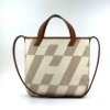 b202606974-hermes-cabas-27 Pre-Owned/ Pre-Loved/ Second-Hand Hermes Cabas 27, Bag in Gold Color, 27 Size, Front View