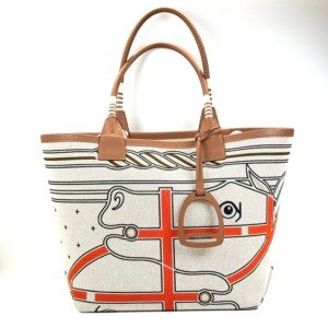 b2026061100-hermes-steeple-28-toile-canvas Pre-Owned/ Pre-Loved/ Second-Hand Hermes Steeple 28 Toile Canvas, Bag in Gold Swift Leather Handles, Ecru/Multi-Colour Canvas Color, L 28 x H 28.5 x D 18 cm Size, Front View