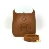 b2026061120-hermes-mini-evelyne-23 Pre-Owned/ Pre-Loved/ Second-Hand Hermes Mini Evelyne 23, Bag in Gold, Gold Hardware Color, Size, Front View