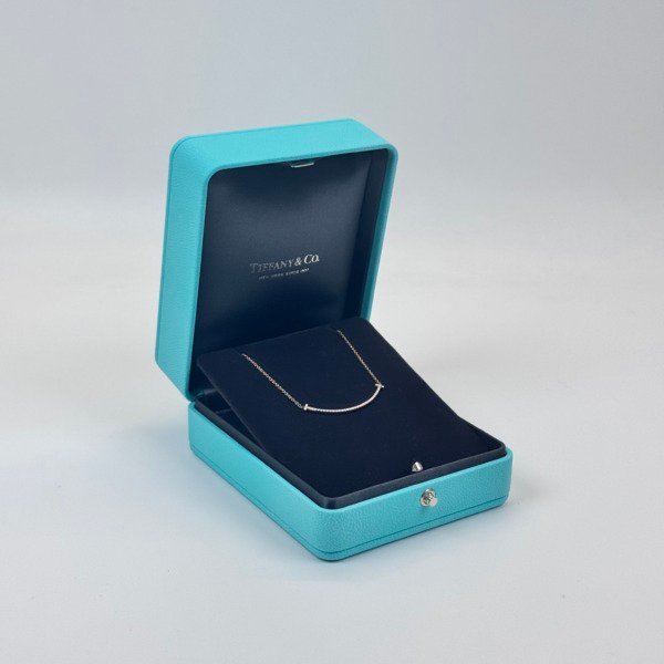 c2026081190-tiffany-co-diamond-t-smile-small-model-1 Tiffany & Co. | Diamond T Smile, Small Model